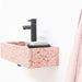 roze toilet wastafeltjes in marmer